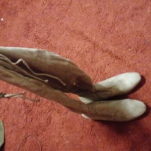 Thigh boots with gold glitter heels